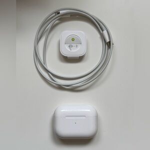 apple airpods pro 2 with wireless charging case, lightning cable, and ear tips
